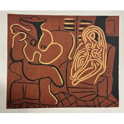 FEMME DANS UN FAUTEUIL ET GUITARISTE